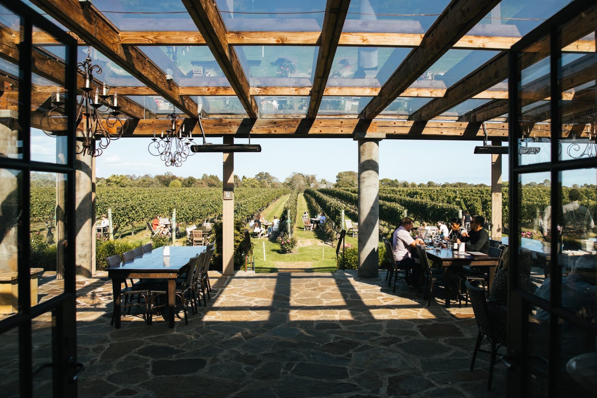 Vine rows seen from the covered patio at Wölffer Estate in Sagaponack
